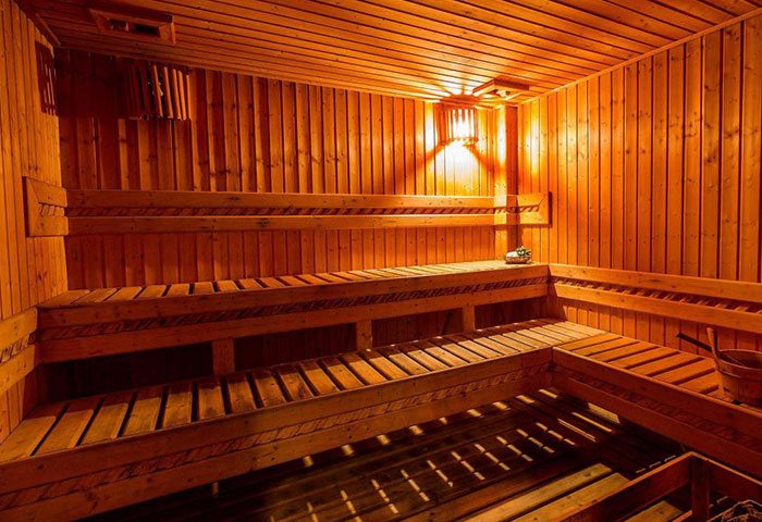 Sauna at Zing Resort & Spa. Popular gay hotel near gay bars. Wooden benches, walls, and ceiling create a warm, relaxing atmosphere.