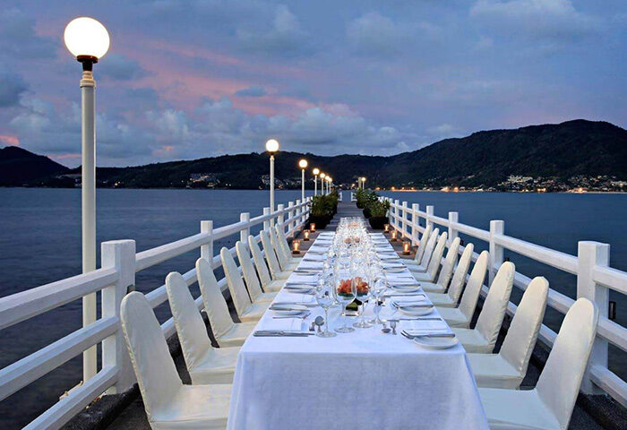 Amari Phuket, Thailand wedding venue. Pier table setting for gay couples. Popular destination for LGBT travel.