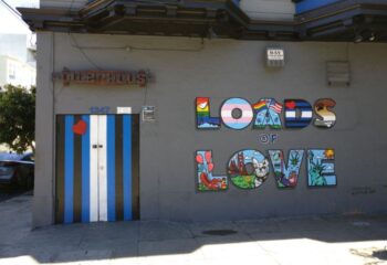 Powerhouse Gay Bar in San Francisco: Building exterior with Loads of Love mural. Gay travel advice, LGBT-friendly destination.
