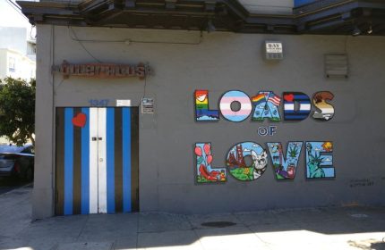 Powerhouse Gay Bar in San Francisco: Building exterior with Loads of Love mural. Gay travel advice, LGBT-friendly destination.