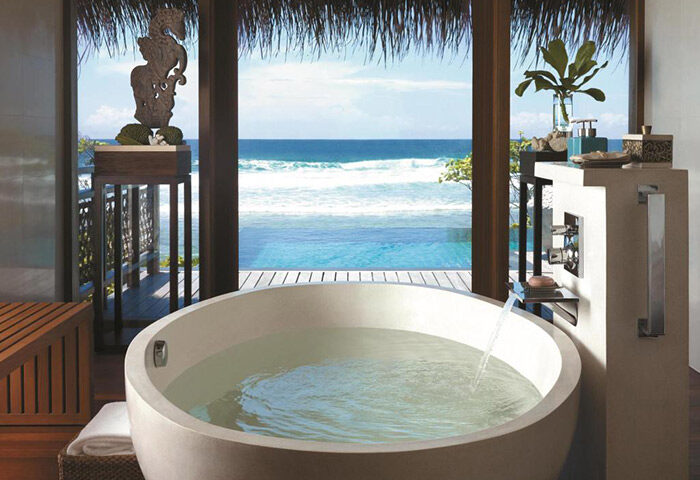 Shangri-La's Villingili Resort & Spa: Private pool villa bathroom with ocean view. Gay honeymoon hotel in Maldives. Luxury travel.