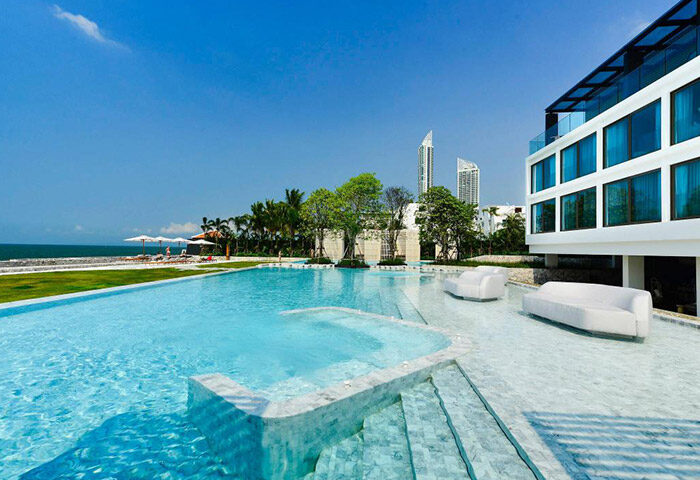 Veranda Resort Pattaya pool. Luxury beachfront hotel for gay honeymoon. Quiet, private getaway. MGallery hotel with stylish design.