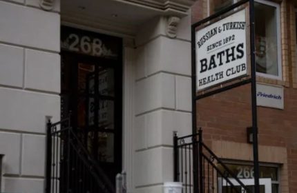 Russian and Turkish Baths in New York. Exterior view of the entrance to a bathhouse, a popular destination for gay men's travel.