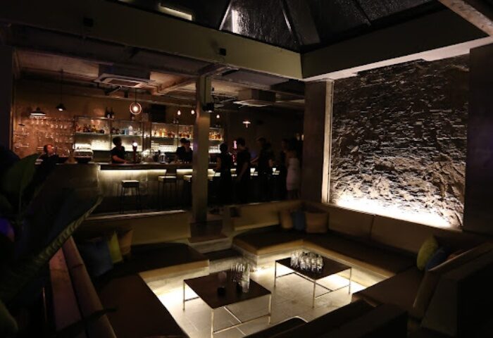 Savage Hanoi bar interior. Stylish gay nightlife spot with seating and bar, perfect for gay travel in Hanoi, Vietnam.