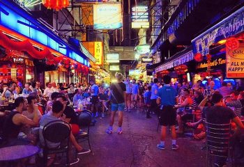 Silom Soi 4, Bangkok's best gay street. Night scene with crowds at bars and restaurants. Popular destination for gay men travelers.