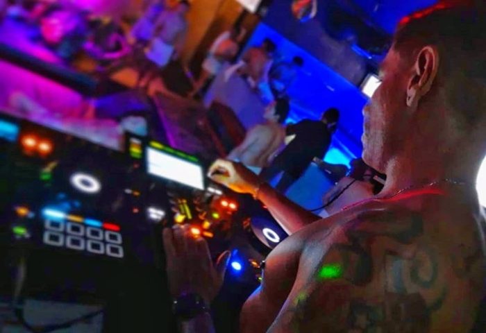 Sodome Bath House: DJ at gay bathhouse, mixing music for the crowd. Nightlife scene with men. Sodome-Bath-House-2.jpg. Gay travel advice.