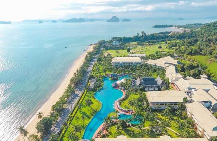 Aerial view of Sofitel Krabi Phokeethra Golf and Spa Resort, a gay-friendly resort. Beachfront property with pool, golf course, and spa.