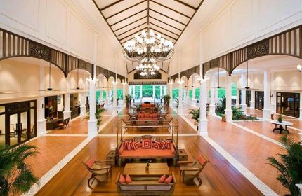 Sofitel Krabi Phokeethra Resort lobby. Grand hall with chandeliers, columns, and seating. Luxury travel for gay men in Thailand.