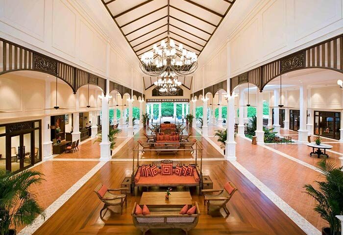 Sofitel Krabi Phokeethra Resort lobby. Grand hall with chandeliers, columns, and seating. Luxury travel for gay men in Thailand.