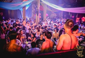 Sweet Soul Cafe gay dance party in Soi Green Mango, Chaweng Beach, Samui. A lively crowd enjoys the vibrant atmosphere of this gay-friendly venue.