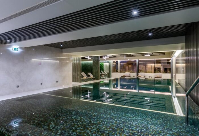 Indoor pool at TUI Blue Gardens, an adults-only Savoy Signature hotel in Madeira. Great for gay men's travel. Relaxing vacation spot.