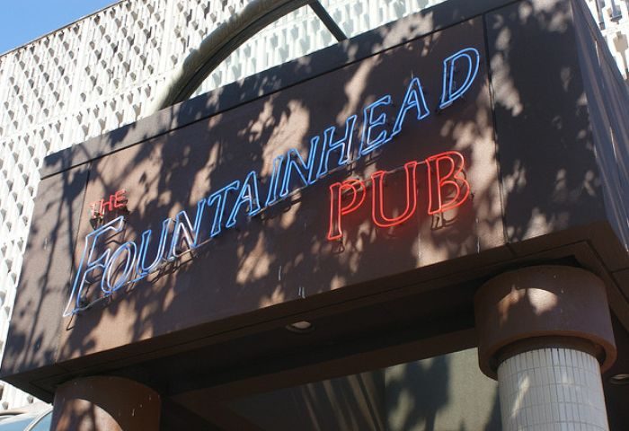 The Fountainhead Pub in Vancouver. Neon sign of a popular gay-friendly bar. Vancouver's nightlife for gay men travel advice.