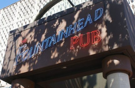The Fountainhead Pub in Vancouver. Neon sign of a popular gay-friendly bar. Vancouver's nightlife for gay men travel advice.