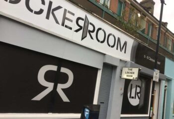 The Locker Room gay sauna exterior. Building front with signage. Gay travel destination, sauna, and social venue.