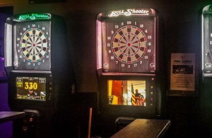 Chicago's North End gay sports bar: electronic dart boards. Bull Shooter game with digital display, a fun activity for gay travelers.