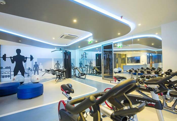 The SIS Kata Resort gay-friendly hotel Phuket gym. Fitness center with weights, machines, and cardio equipment for a healthy vacation.