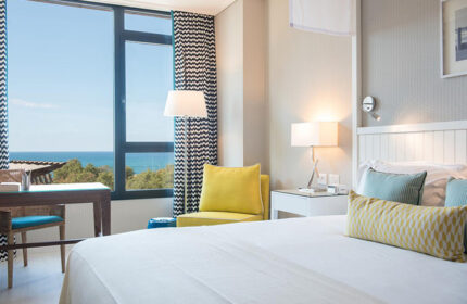 Melody Hotel, an Atlas Boutique Hotel room interior. This year's most booked gay hotel in Hilton Gay Beach. Room with sea view.