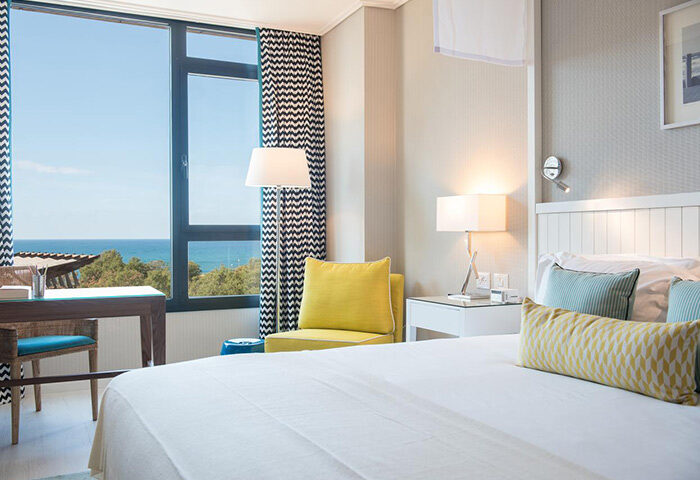 Melody Hotel, an Atlas Boutique Hotel room interior. This year's most booked gay hotel in Hilton Gay Beach. Room with sea view.