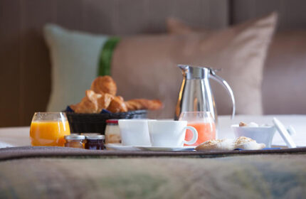 Hotel de la Place du Louvre's best breakfast in bed. Parisian pastries, juice, coffee, and jams. Gay-friendly hotel in the Marais district.