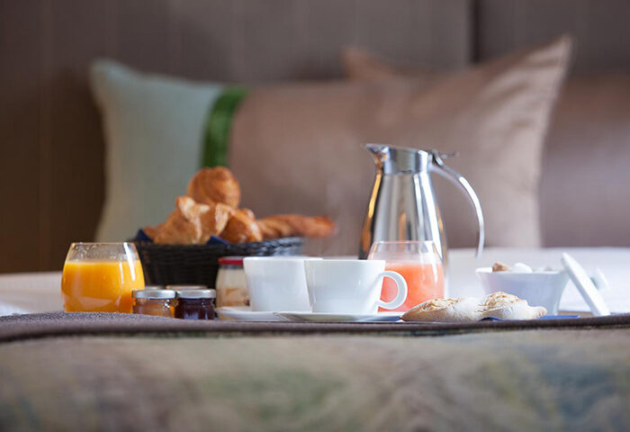 Hotel de la Place du Louvre's best breakfast in bed. Parisian pastries, juice, coffee, and jams. Gay-friendly hotel in the Marais district.