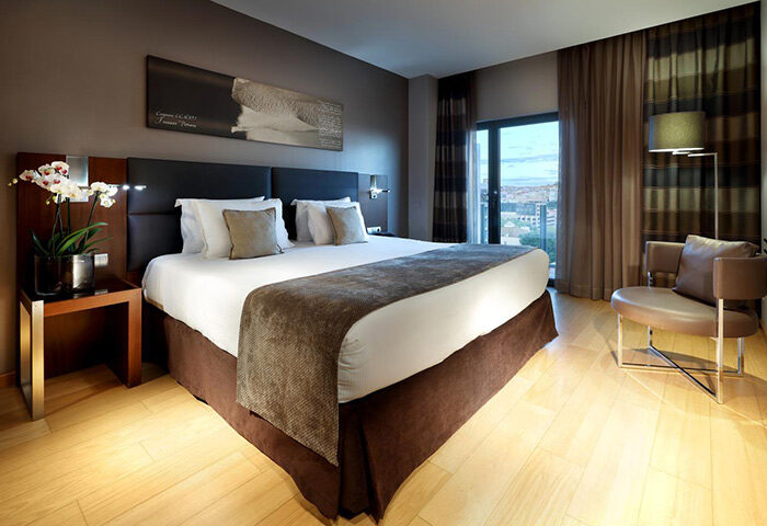 Eurostars Hotel das Letras honeymoon suite in Lisbon's gayborhood. Modern room with city view, ideal for gay couples' romantic getaway.