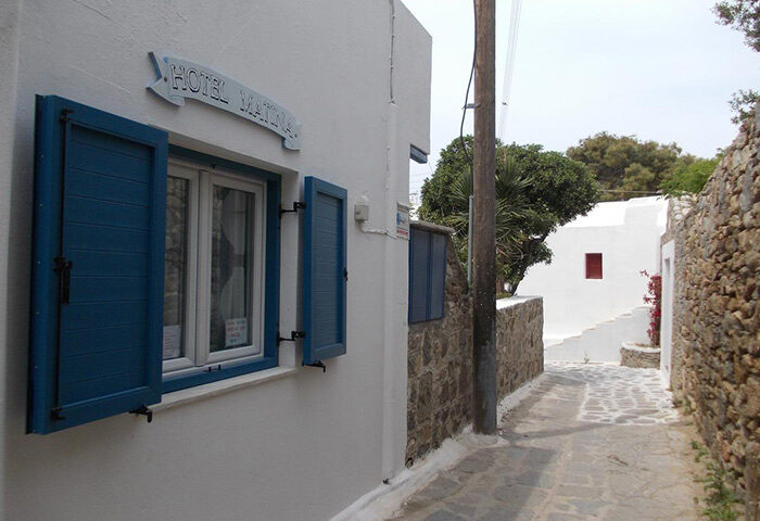 Matina Hotel in Mykonos Town's gayborhood. This cheap and quiet hotel features blue shutters and whitewashed walls, typical of Mykonos architecture.