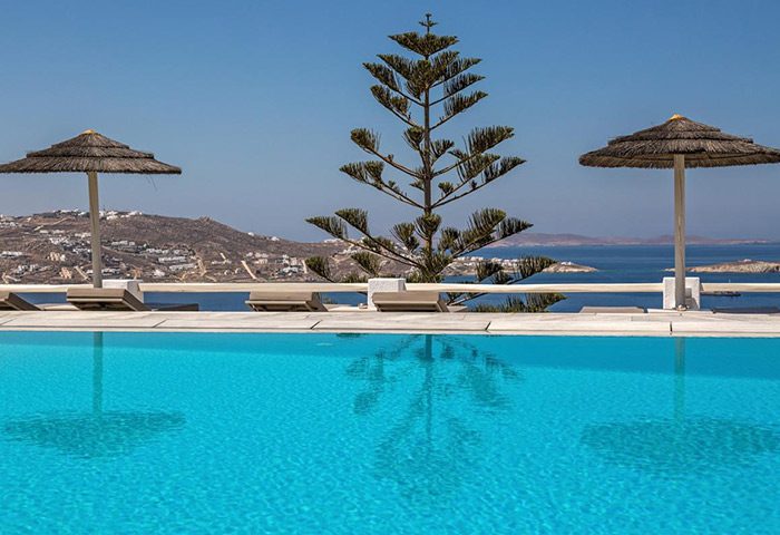 Hotel Alkyon's pool view in Mykonos Town. Open gay hotels in Mykonos offer stunning views and a welcoming atmosphere for gay travelers.