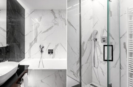 Hotel Kings Court, gay-friendly hotel in Prague Old Town: Modern bathroom with marble tiles, bathtub, and shower. This year's update.