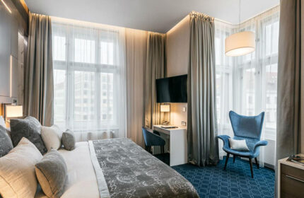 Hotel Kings Court stylish room in Prague's Old Town. Luxury gay hotel in central Prague. Modern design, comfortable bed, and city views.