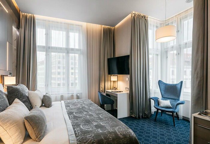 Hotel Kings Court stylish room in Prague's Old Town. Luxury gay hotel in central Prague. Modern design, comfortable bed, and city views.