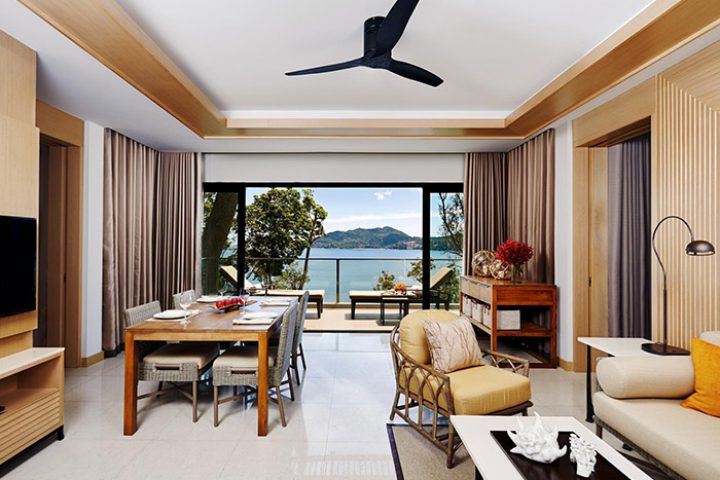 Amari Phuket, Thailand: Beachfront suite interior. Gay honeymooners' hotel with ocean view, dining table, and stylish decor. Top destination.