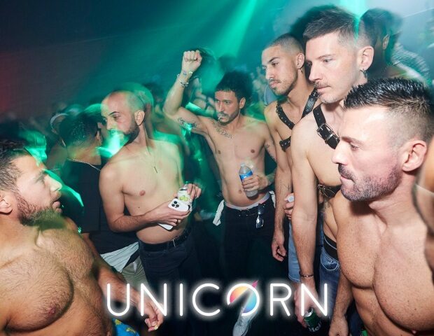 Union Club: Go-go boys at Unicorn, a top gay dance club in London. Late night party scene, shirtless men, and vibrant nightlife.