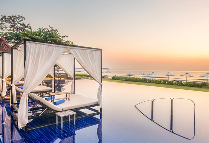 Vana Belle, Koh Samui resort view. Beachfront cabanas and infinity pool offer a romantic gay honeymoon in Thailand at a cheap price.