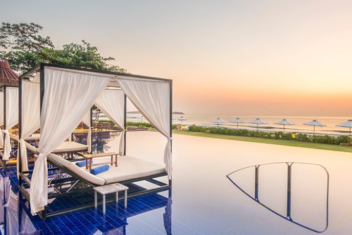 Vana Belle, Koh Samui resort view. Beachfront cabanas and infinity pool offer a romantic gay honeymoon in Thailand at a cheap price.