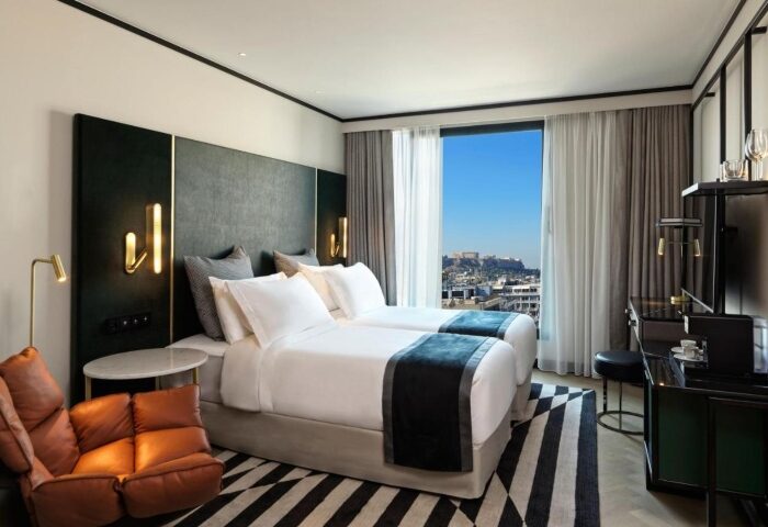 Academias Hotel, Autograph Collection, Athens. Gay-friendly hotel room with twin beds, Acropolis view, stylish decor. Top gay hotels near gay bars.