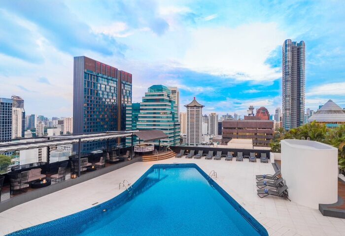 Rooftop pool at voco Orchard Singapore, an IHG Hotel. Top gay hotel with skyline views near China Town. A great place for gay travelers.