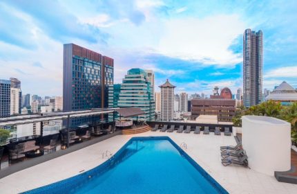 Rooftop pool at voco Orchard Singapore, an IHG Hotel. Top gay hotel with skyline views near China Town. A great place for gay travelers.