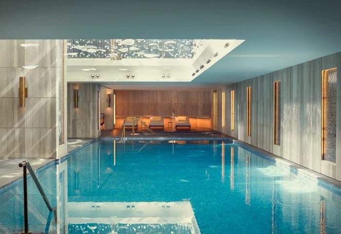 Raffles Istanbul Hotel's indoor pool. One of the top gay hotels in Istanbul, Turkey. Modern design, relaxing atmosphere, perfect for gay travel.