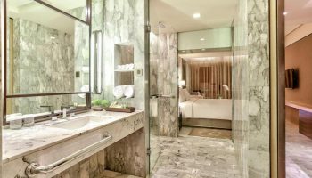 DoubleTree by Hilton Hotel Sukhumvit Bangkok bathroom. Marble interior, glass shower. Gay-friendly hotel in Bangkok. Top popular hotel.