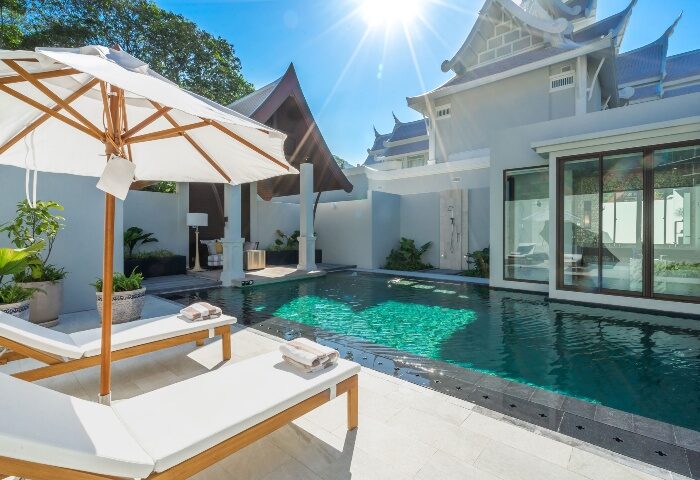InterContinental Phuket Resort pool villa. Top luxury gay beach hotel with sun loungers and umbrella. IHG Hotel for gay travel.