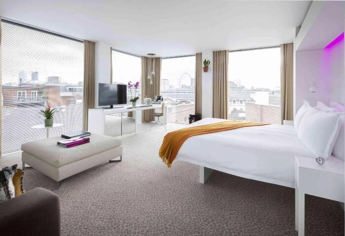 St Martins Lane Hotel London room view. Luxury gay hotels near Soho nightlife. Modern design, city views, comfort. Perfect for gay travel.