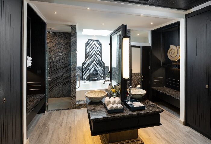 Luxury suite bathroom at InterContinental Pattaya Resort, a top gay hotel. Features modern design, soaking tub, & upscale amenities.