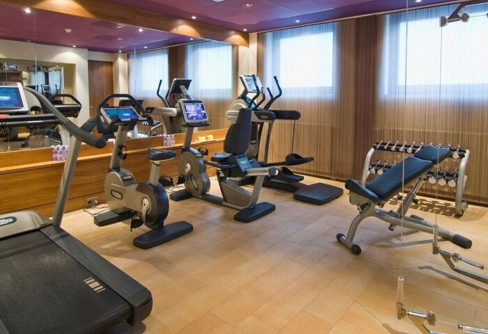 Sofitel Legend The Grand Amsterdam gym. Top luxury gay hotel wellness center with cardio machines, weights, & modern equipment. Amsterdam city center.