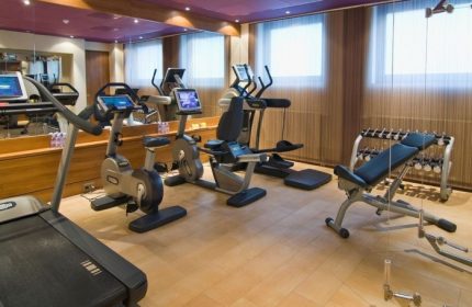 Sofitel Legend The Grand Amsterdam gym. Top luxury gay hotel wellness center with cardio machines, weights, & modern equipment. Amsterdam city center.