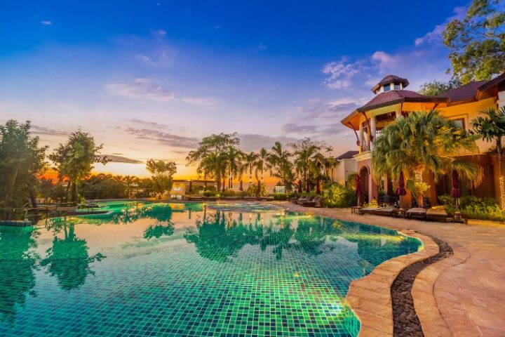InterContinental Pattaya Resort pool at sunset. Top romantic gay beachfront hotel in Pattaya, Thailand. IHG Hotel.