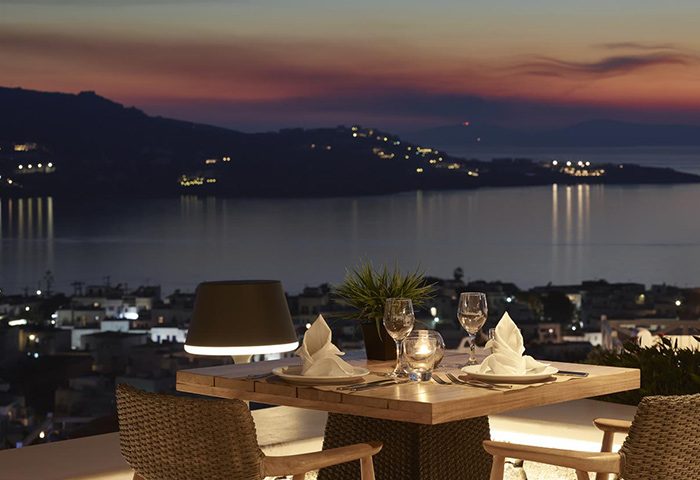 Romantic top sea view restaurant in Mykonos Town, Vencia Boutique Hotel. Gayborhood hotel dining with sunset views.