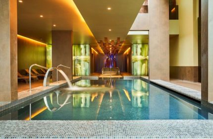 Saccharum Madeira Portugal: Top spa beach resort gay hotel in Madeira. Indoor pool with water feature at the Saccharum Hotel, perfect for gay travel.