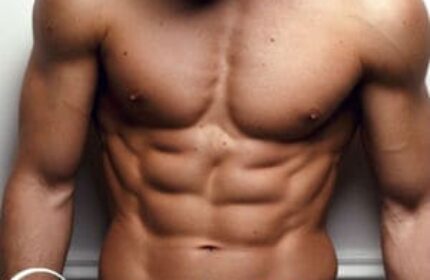 Touch Of London Gay Massage Spa: Muscular torso of a man with well-defined abs. Gay travel advice for London massage and spa services.