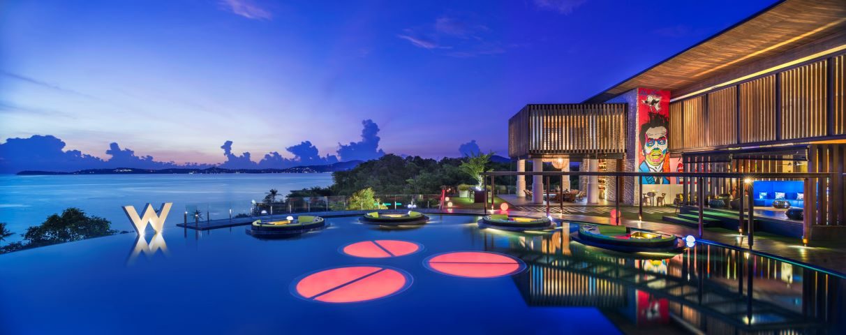 WOOBAR Pride Party in Samui. Luxury gay travel destination with infinity pool, ocean view, and vibrant nightlife. Pride celebration.
