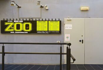 Zoo Men's cruising bar sign in Gran Canaria. Gay cruise club with dress code. Nightlife for gay men. Travel guide.